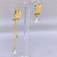 Sparkling asymmetric rose earrings