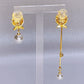 Sparkling asymmetric rose earrings